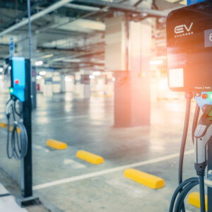 Blurred,Electric,Car,Charging,Station,For,Charge,Ev,Battery.,Plug